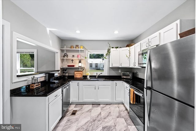 3048 Oakland Rd, Louisa, VA 23093 - kitchen with appliances with stainless steel finishes, healthy amount of natural light, white cabinets, open shelves, and recessed lighting
