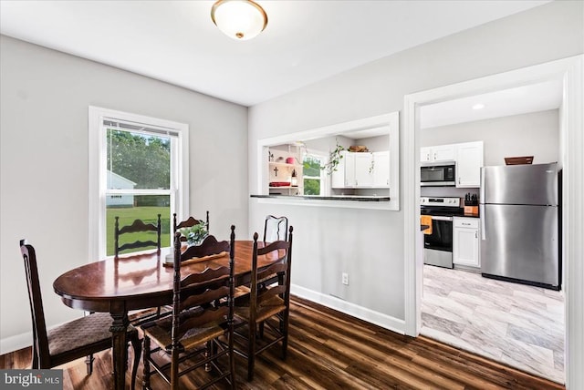 3048 Oakland Rd, Louisa, VA 23093 - dining space with baseboards and dark wood-style flooring