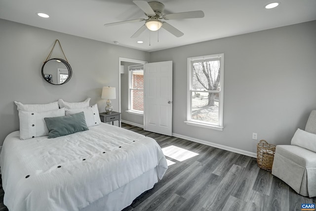 bedroom featuring baseboards, dark wood-type flooring, recessed lighting, and a ceiling fan