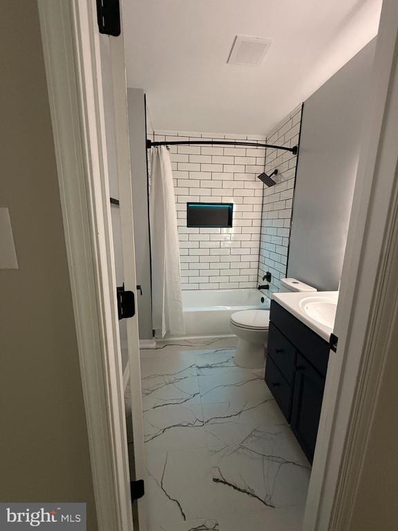 543 Elk Creek Rd, Mineral, VA 23117 - bathroom with marble finish floors, vanity, and shower / bathtub combination with curtain