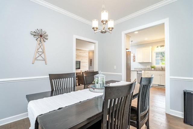 4517 Wiltshire St, Rockingham, VA 22802 - dining room with ornamental molding, hardwood / wood-style flooring, a chandelier, and baseboards