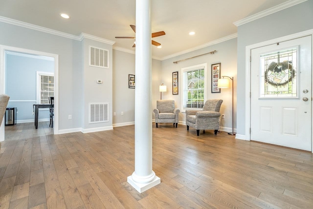 4517 Wiltshire St, Rockingham, VA 22802 - entrance foyer with a ceiling fan, wood-type flooring, ornate columns, ornamental molding, and baseboards