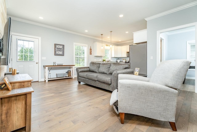 4517 Wiltshire St, Rockingham, VA 22802 - living area with light wood-type flooring, ornamental molding, recessed lighting, and baseboards