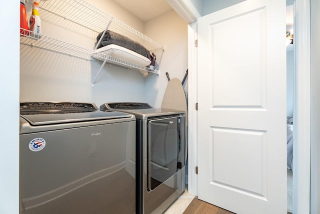 4517 Wiltshire St, Rockingham, VA 22802 - laundry area with separate washer and dryer and light wood finished floors
