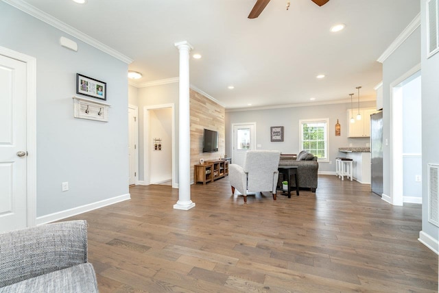 4517 Wiltshire St, Rockingham, VA 22802 - living room with ornamental molding, ceiling fan, wood finished floors, ornate columns, and baseboards