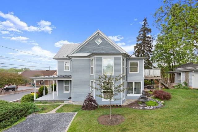 121 Central St S, Broadway, VA 22815 - view of front facade with a standing seam roof, a front lawn, metal roof, stairs, and a wooden deck