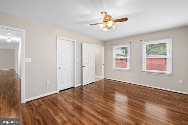 500 Maple Grove Dr, Fredericksburg, VA 22407 - unfurnished bedroom with wood finished floors and a ceiling fan