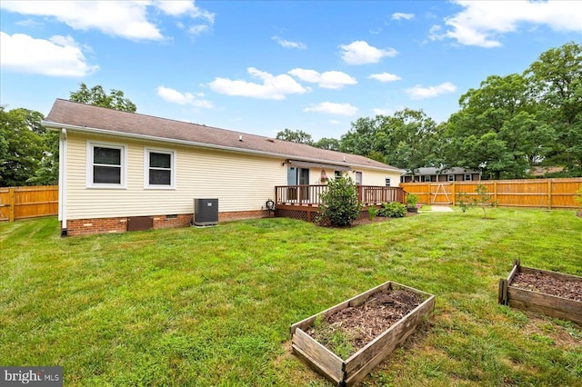 500 Maple Grove Dr, Fredericksburg, VA 22407 - back of property with a garden, a fenced backyard, a wooden deck, and crawl space