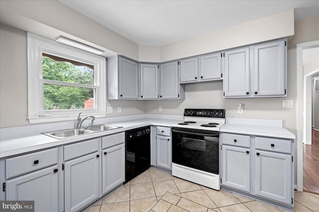 500 Maple Grove Dr, Fredericksburg, VA 22407 - kitchen with electric range, dishwasher, light countertops, and gray cabinetry