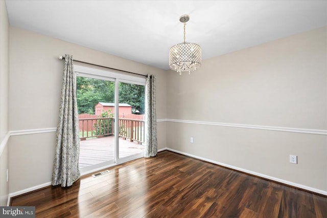 500 Maple Grove Dr, Fredericksburg, VA 22407 - empty room with a chandelier and wood finished floors