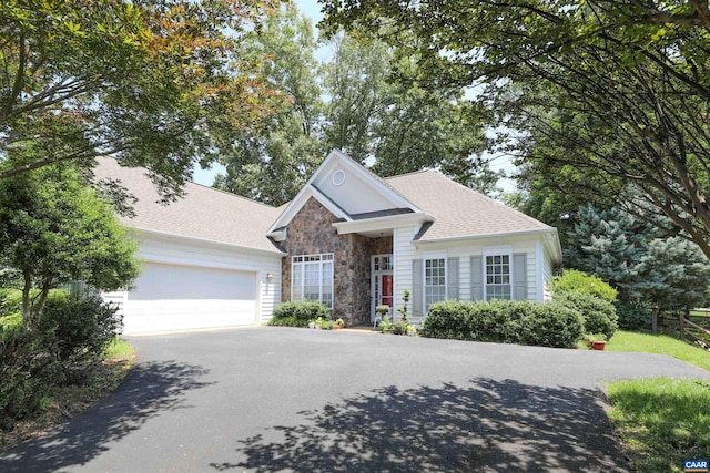 515 Broadleaf Way, Charlottesville, VA 22911 - view of front facade featuring stone siding, driveway, a garage, and a shingled roof