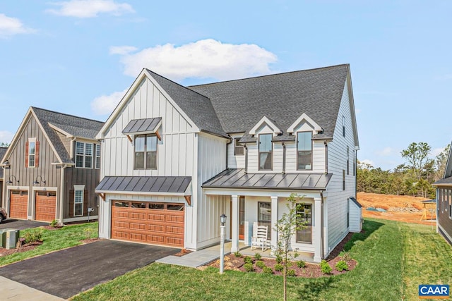 33 Fowler St Unit C, Charlottesville, VA 22911 - modern farmhouse with a porch, a garage, metal roof, board and batten siding, and a standing seam roof