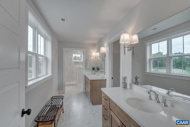 33 Fowler St Unit C, Charlottesville, VA 22911 - full bathroom with a sink, two vanities, marble finish floor, and visible vents