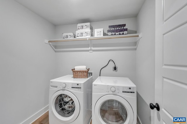 33 Fowler St Unit C, Charlottesville, VA 22911 - clothes washing area featuring baseboards, laundry area, wood finished floors, and washer and clothes dryer