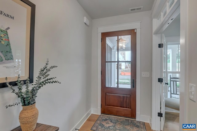 33 Fowler St Unit C, Charlottesville, VA 22911 - entryway featuring an inviting chandelier, plenty of natural light, visible vents, and baseboards