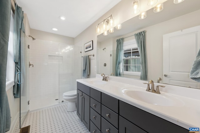 6211 Raynor Pl, Crozet, VA 22932 - full bathroom featuring tile patterned floors, a shower stall, double vanity, toilet, and recessed lighting