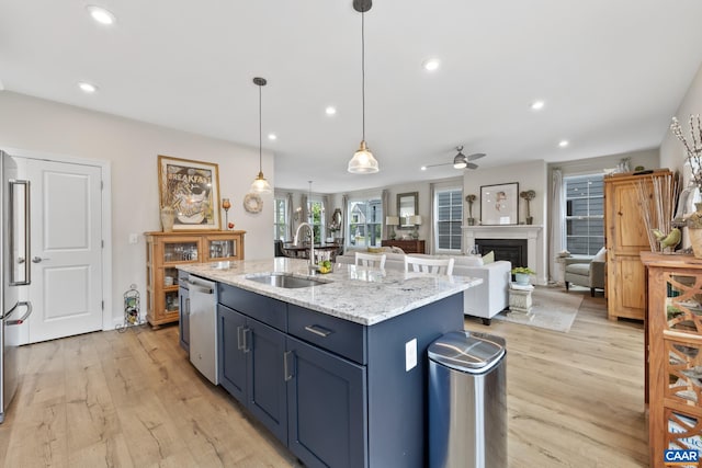 6211 Raynor Pl, Crozet, VA 22932 - kitchen featuring a sink, appliances with stainless steel finishes, ceiling fan, light wood-style floors, and recessed lighting