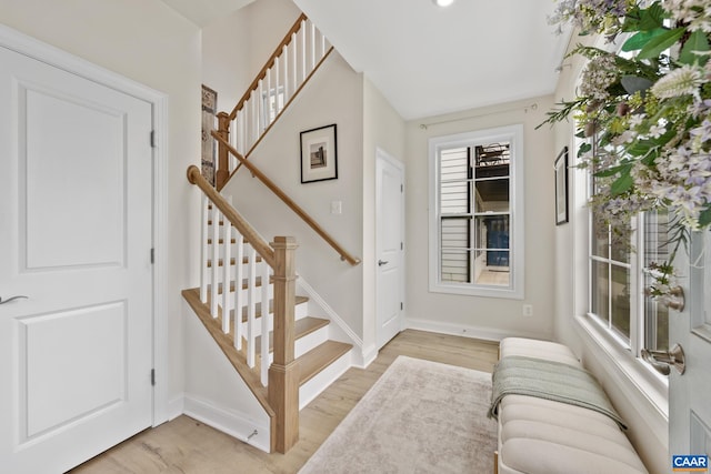 6211 Raynor Pl, Crozet, VA 22932 - entrance foyer featuring baseboards, light wood-style floors, and stairs