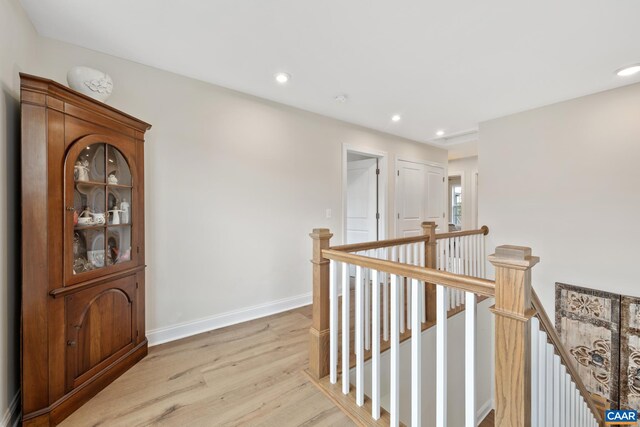 6211 Raynor Pl, Crozet, VA 22932 - corridor with an upstairs landing, light wood finished floors, baseboards, and recessed lighting