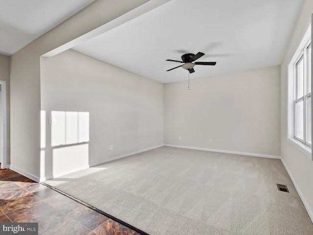 2486 Winthrop Dr, Charlottesville, VA 22911 - spare room featuring ceiling fan, baseboards, and carpet flooring