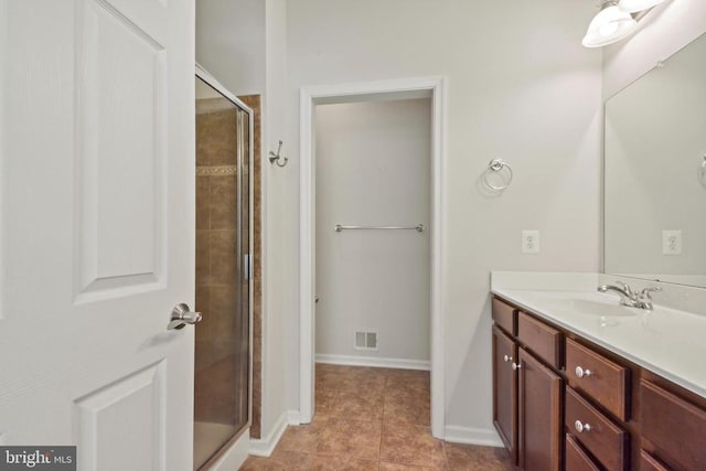 2486 Winthrop Dr, Charlottesville, VA 22911 - bathroom featuring a stall shower, vanity, tile patterned floors, and baseboards