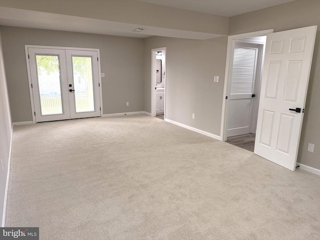 1625 Harrier Ln, Culpeper, VA 22701 - carpeted empty room with french doors and baseboards