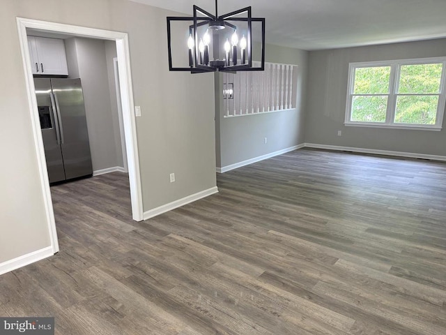 1625 Harrier Ln, Culpeper, VA 22701 - unfurnished dining area with dark wood-style floors and a chandelier