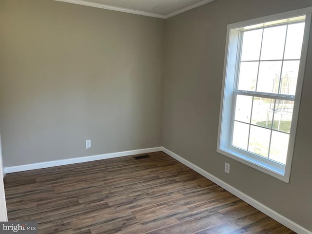 18393 Gaskins Ln, Jeffersonton, VA 22724 - unfurnished room featuring baseboards, ornamental molding, visible vents, and dark wood-type flooring