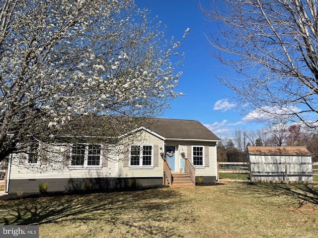 18393 Gaskins Ln, Jeffersonton, VA 22724 - view of front of house with a front yard, an outdoor structure, a shed, and crawl space