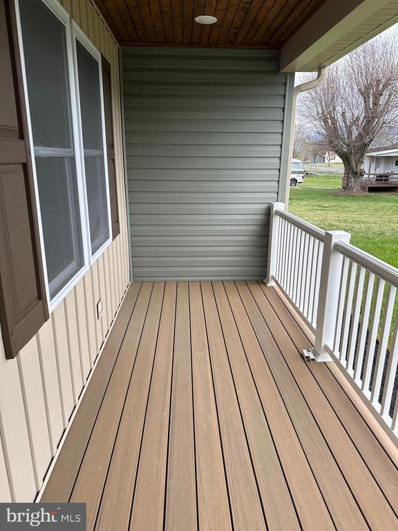 218 Honeyville Rd, Stanley, VA 22851 - wooden deck featuring covered porch