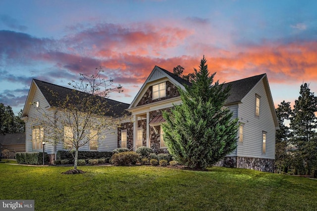 11407 Osprey Trl, Spotsylvania, VA 22551 - view of front facade with stone siding and a lawn