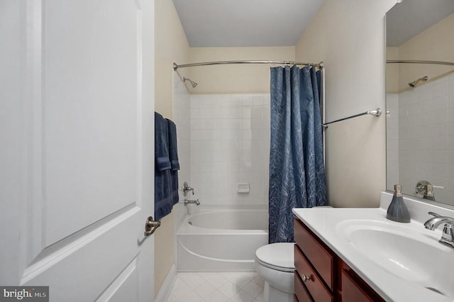 11407 Osprey Trl, Spotsylvania, VA 22551 - full bathroom featuring tile patterned floors, shower / bath combo with shower curtain, toilet, and vanity