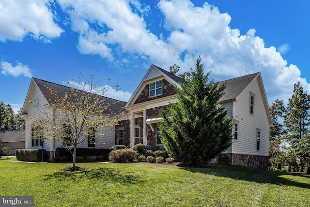 11407 Osprey Trl, Spotsylvania, VA 22551 - view of front of house featuring stone siding and a front lawn