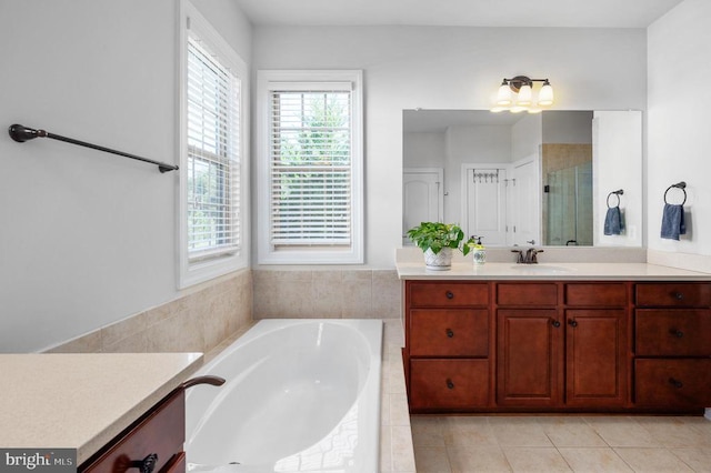 11407 Osprey Trl, Spotsylvania, VA 22551 - bathroom featuring a shower stall, tile patterned flooring, a garden tub, and vanity