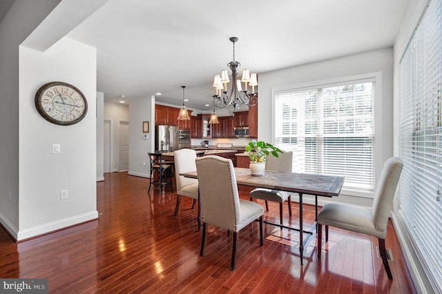 11407 Osprey Trl, Spotsylvania, VA 22551 - dining room featuring recessed lighting, dark wood-type flooring, baseboards, and a notable chandelier