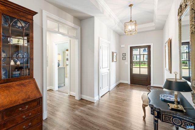 312 Avondale Ln, Crozet, VA 22932 - entryway featuring wood finished floors, a chandelier, and a raised ceiling