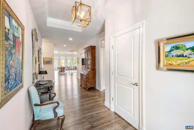 312 Avondale Ln, Crozet, VA 22932 - hall featuring a chandelier, wood finished floors, recessed lighting, and a tray ceiling