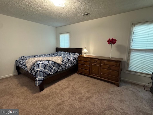588 Meadowbrook Dr, Culpeper, VA 22701 - bedroom featuring light carpet and a textured ceiling