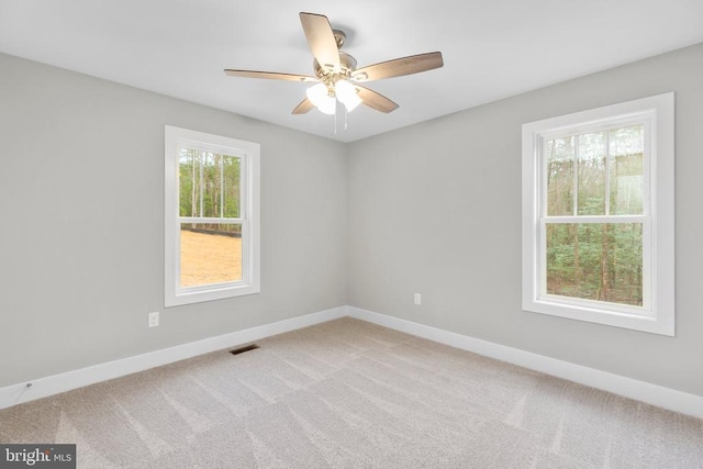 9712 Sutter Rd, Partlow, VA 22534 - unfurnished room with baseboards, carpet, and a ceiling fan
