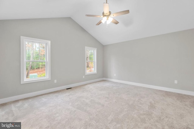 9712 Sutter Rd, Partlow, VA 22534 - empty room featuring healthy amount of natural light, a ceiling fan, lofted ceiling, baseboards, and carpet floors