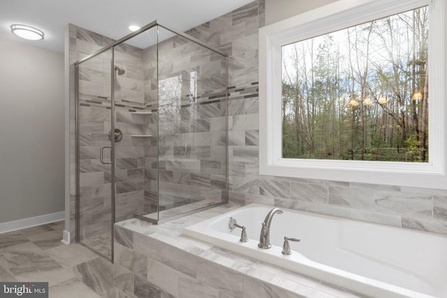 9712 Sutter Rd, Partlow, VA 22534 - bathroom with a garden tub, a stall shower, and baseboards