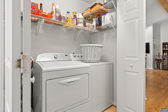 538 Jefferson Dr, Palmyra, VA 22963 - laundry area with washer and clothes dryer and light wood-type flooring