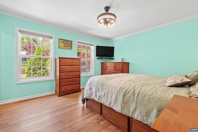 538 Jefferson Dr, Palmyra, VA 22963 - bedroom featuring crown molding, baseboards, and wood finished floors