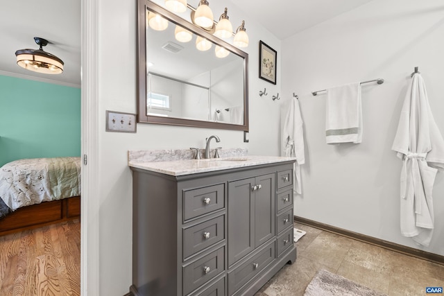 538 Jefferson Dr, Palmyra, VA 22963 - ensuite bathroom with baseboards and vanity