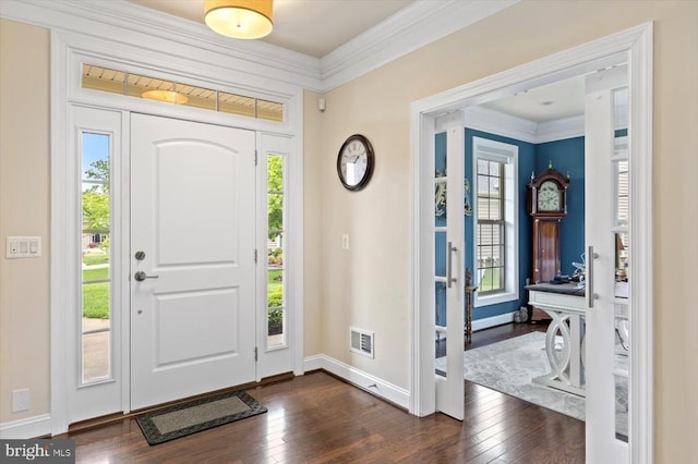 11402 Osprey Trl, Spotsylvania, VA 22551 - foyer entrance featuring dark wood-style flooring, ornamental molding, and baseboards