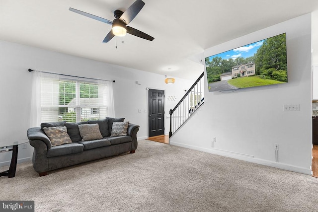9900 Wellford Ct, Fredericksburg, VA 22407 - living area featuring carpet flooring, stairway, ceiling fan, and baseboards
