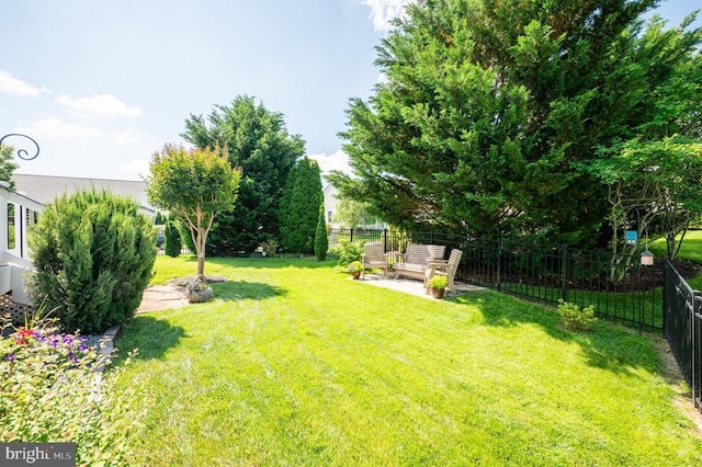  - view of yard with a patio