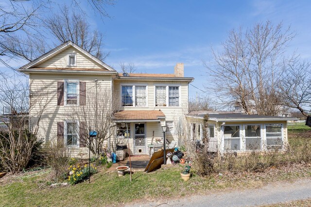 281 High St, Timberville, VA 22853 - traditional home featuring a sunroom and a chimney