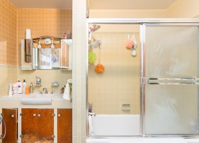 281 High St, Timberville, VA 22853 - bathroom with tile walls, vanity, and shower / bath combination with glass door