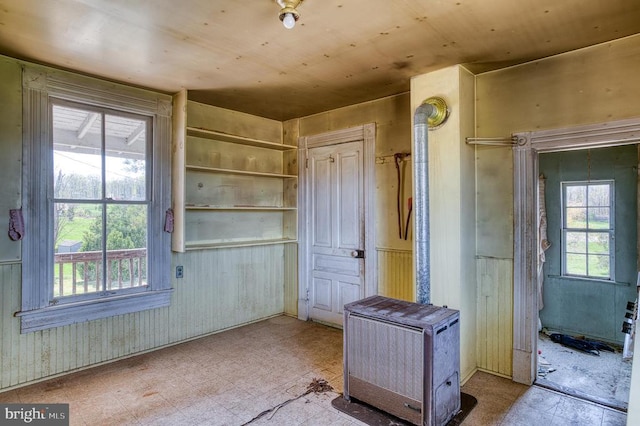 mudroom featuring plenty of natural light and tile patterned floors